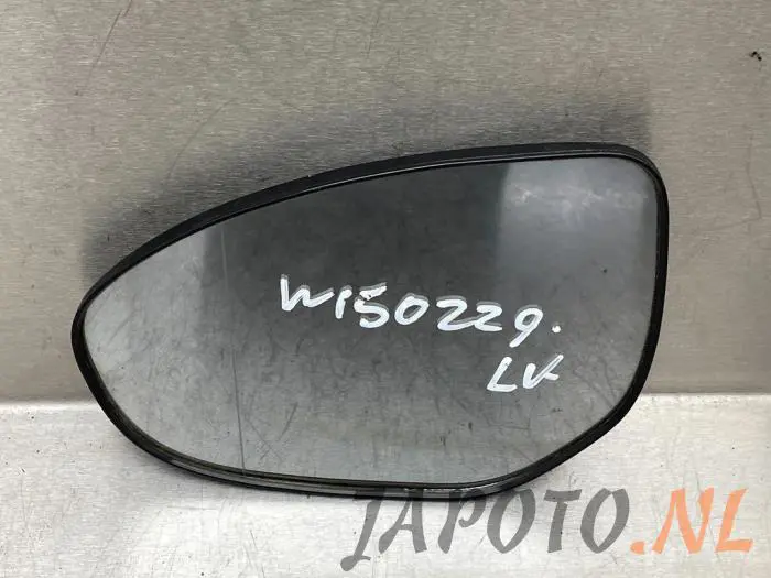 Cristal reflectante izquierda Mazda 2.