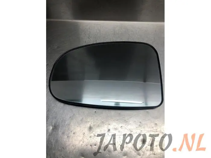 Cristal reflectante izquierda Toyota IQ